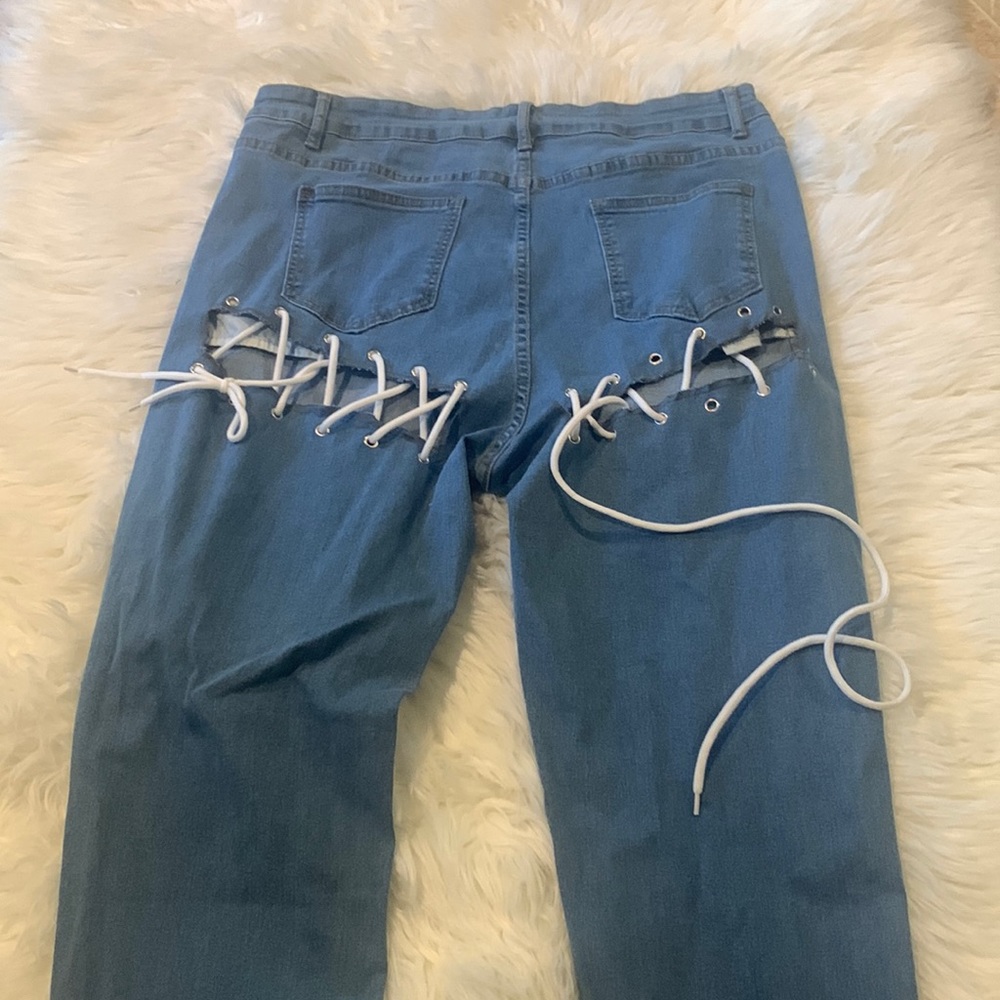 SHEIN Plus/Curve High Waist Lace Up Slant Pocket Jeans with a Medium Wash